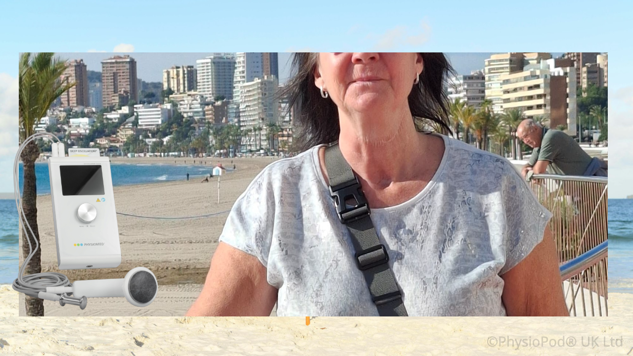 Amanda by the seaside with a physiopod for head and neck lymphoedema